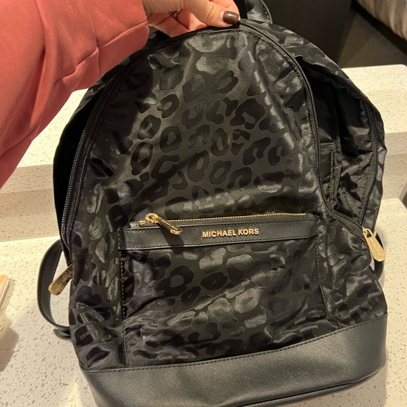 Michael Kors Handbags - Michael Kors Black Patterned Backpack